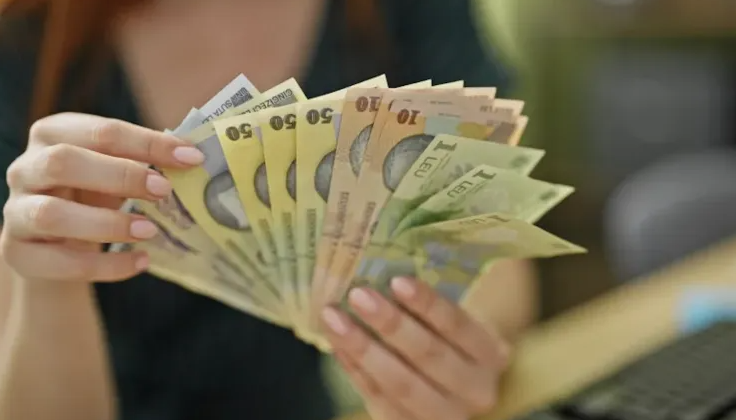Mai mulți bani pe hârtie, taxe mai mari în realitate! Ce se schimbă de la 1 iulie pentru români